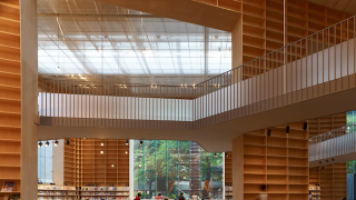 Illustration for article titled A Towering Temple of Bookshelves for Books and Readers